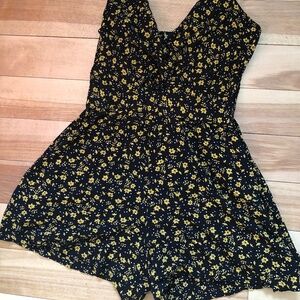 ECLIPSE black romper with yellow flower pattern size medium